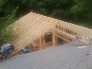 Framing a new roof addition that ties into an existing shingle roof in Elkhorn