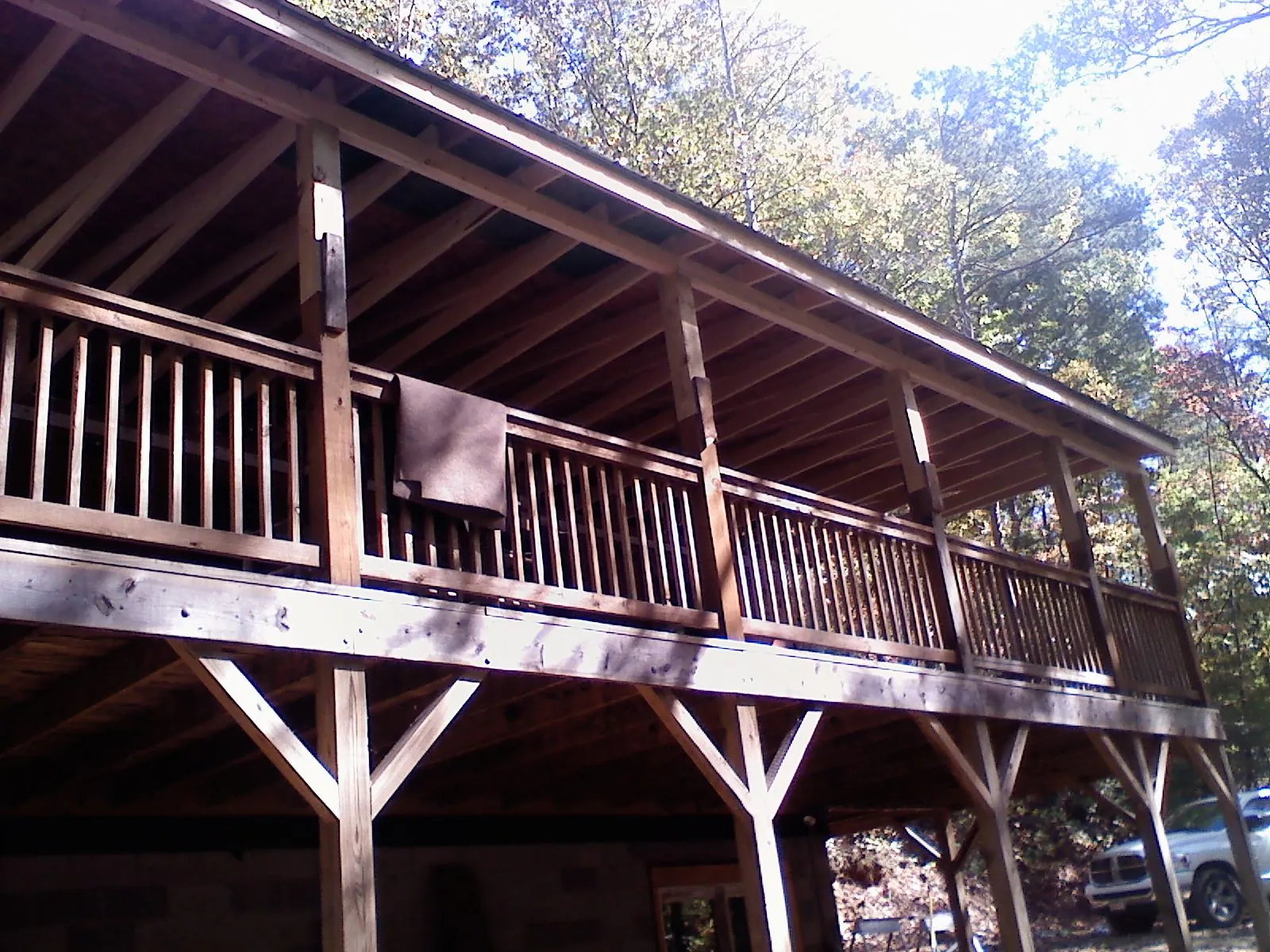 Timber framing under a new elevated porch and deck — Roof Leak Repair in Elkhorn by Roofing Brothers